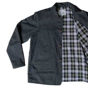 The gunpowder HebTroCo Jacksnipe Overjacket with a tartan lining