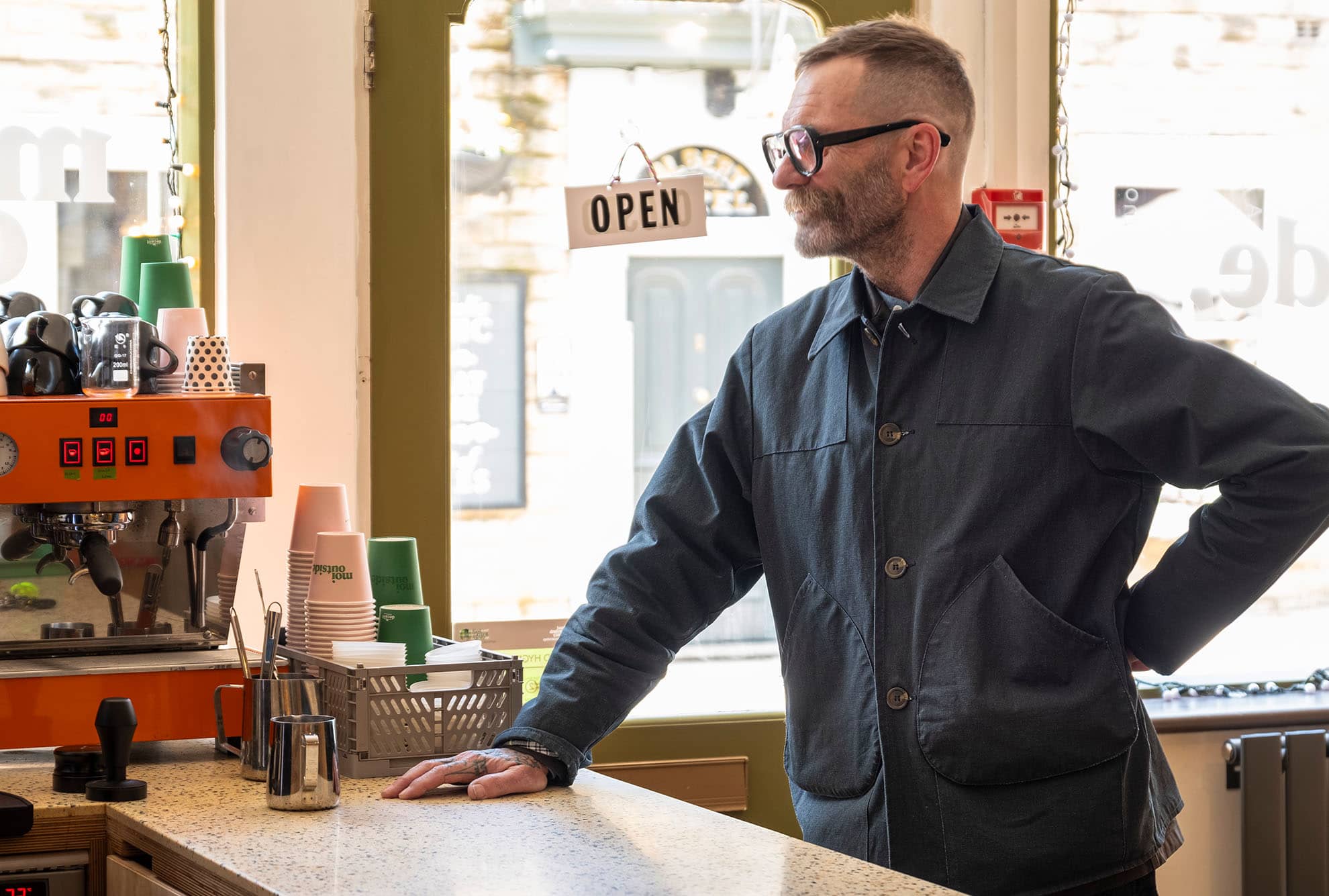 Ed wears the Jacksnipe Overjacket in Gunpowder colour at Moi Outside in Hebden Bridge
